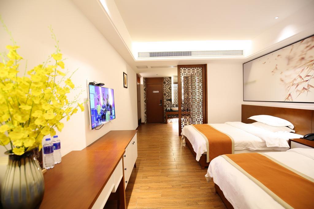 All Seasons Lodge Чжанцзяцзе Экстерьер фото