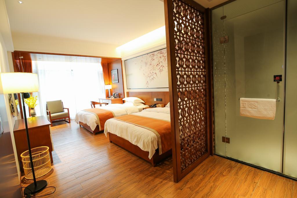 All Seasons Lodge Чжанцзяцзе Экстерьер фото