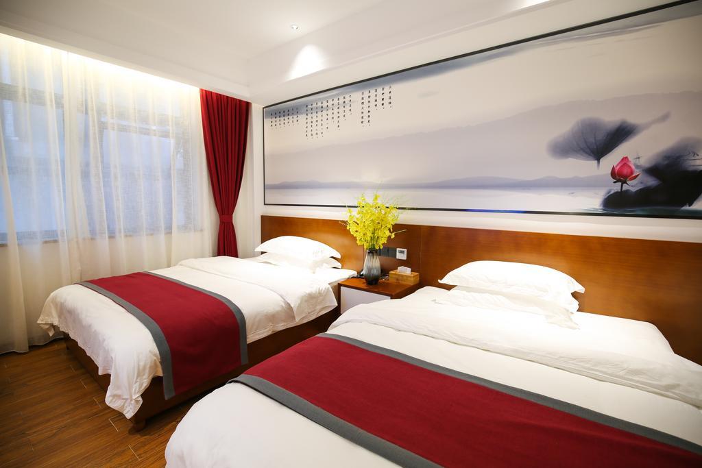 All Seasons Lodge Чжанцзяцзе Экстерьер фото