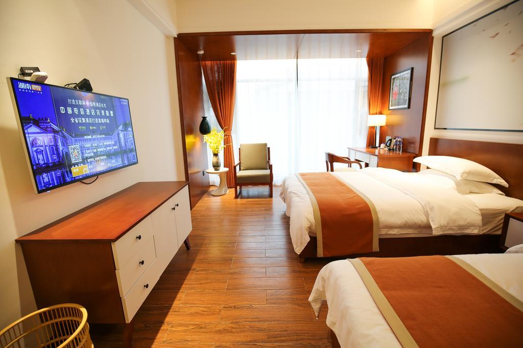 All Seasons Lodge Чжанцзяцзе Экстерьер фото