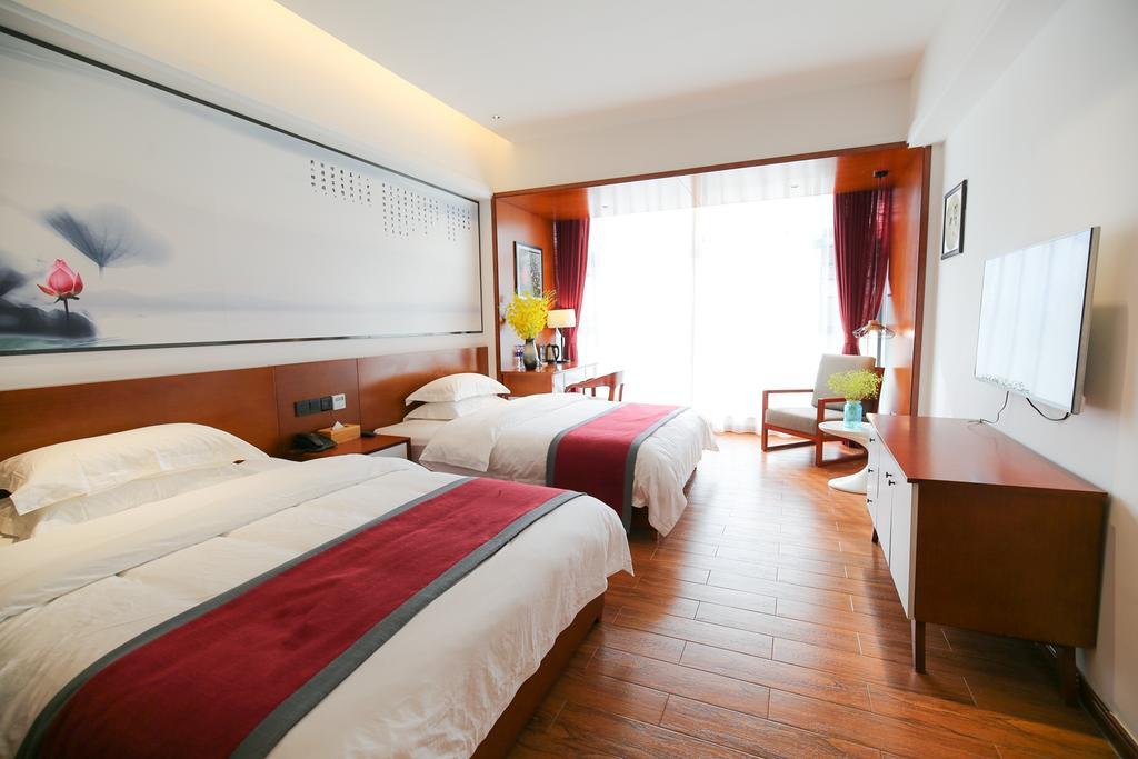 All Seasons Lodge Чжанцзяцзе Экстерьер фото