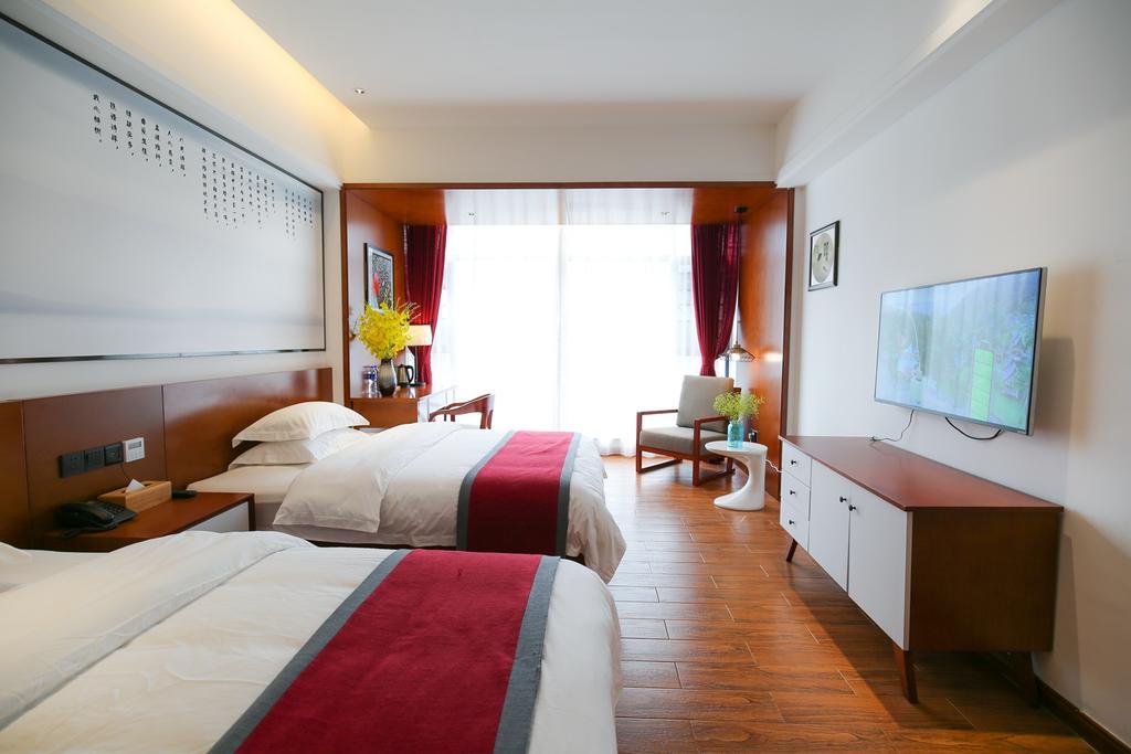 All Seasons Lodge Чжанцзяцзе Экстерьер фото