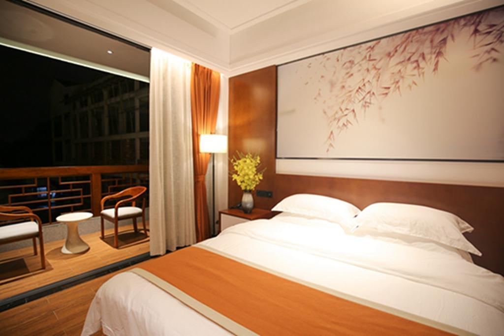 All Seasons Lodge Чжанцзяцзе Экстерьер фото