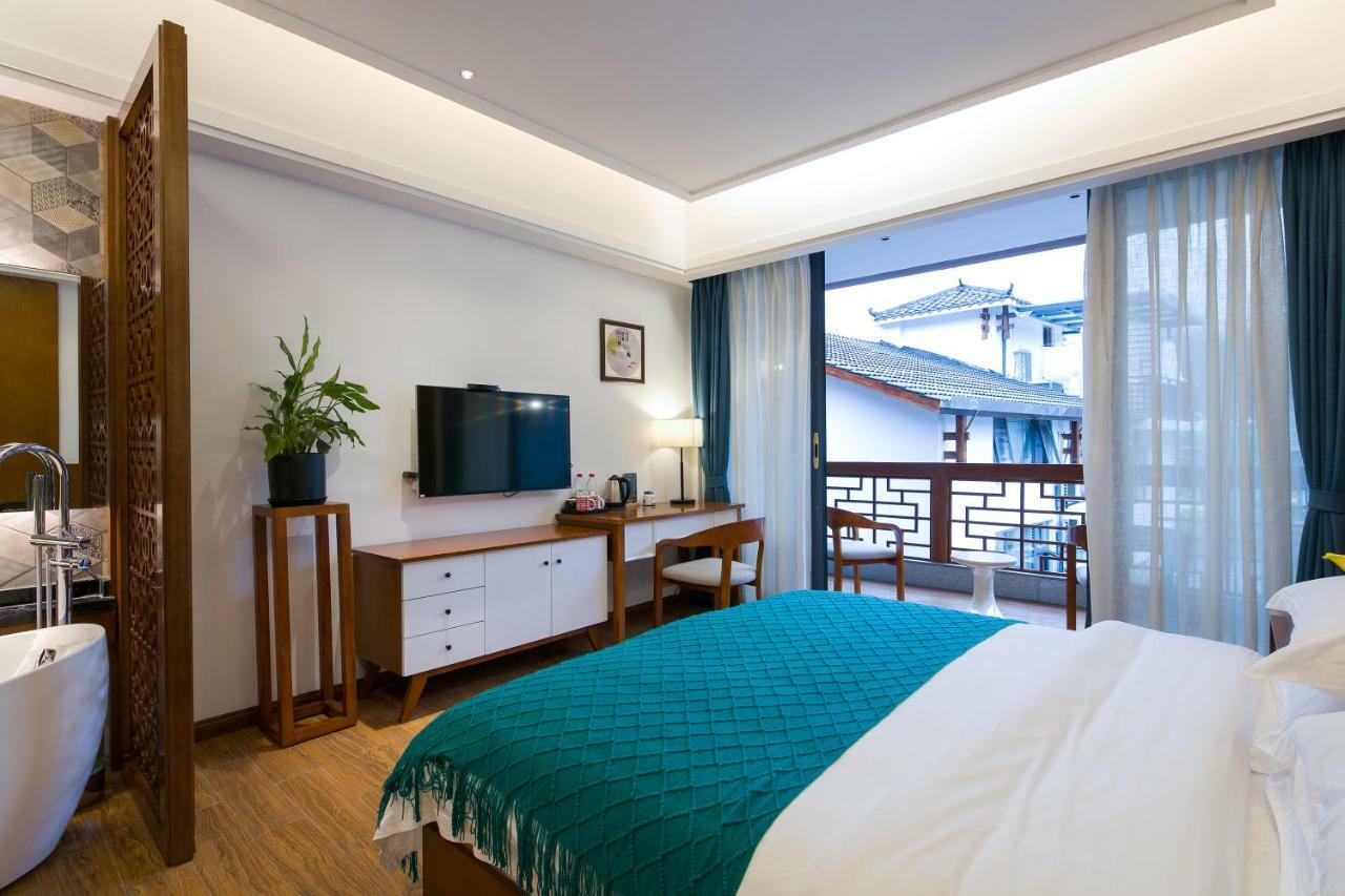 All Seasons Lodge Чжанцзяцзе Экстерьер фото