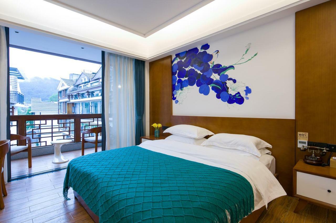 All Seasons Lodge Чжанцзяцзе Экстерьер фото