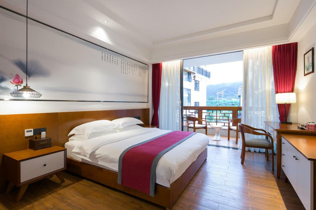 All Seasons Lodge Чжанцзяцзе Экстерьер фото
