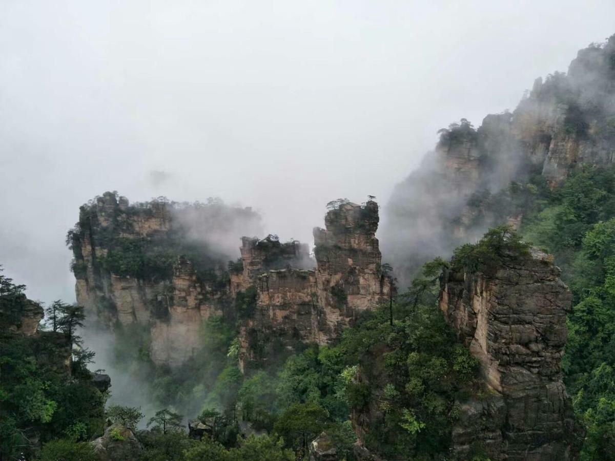 All Seasons Lodge Чжанцзяцзе Экстерьер фото
